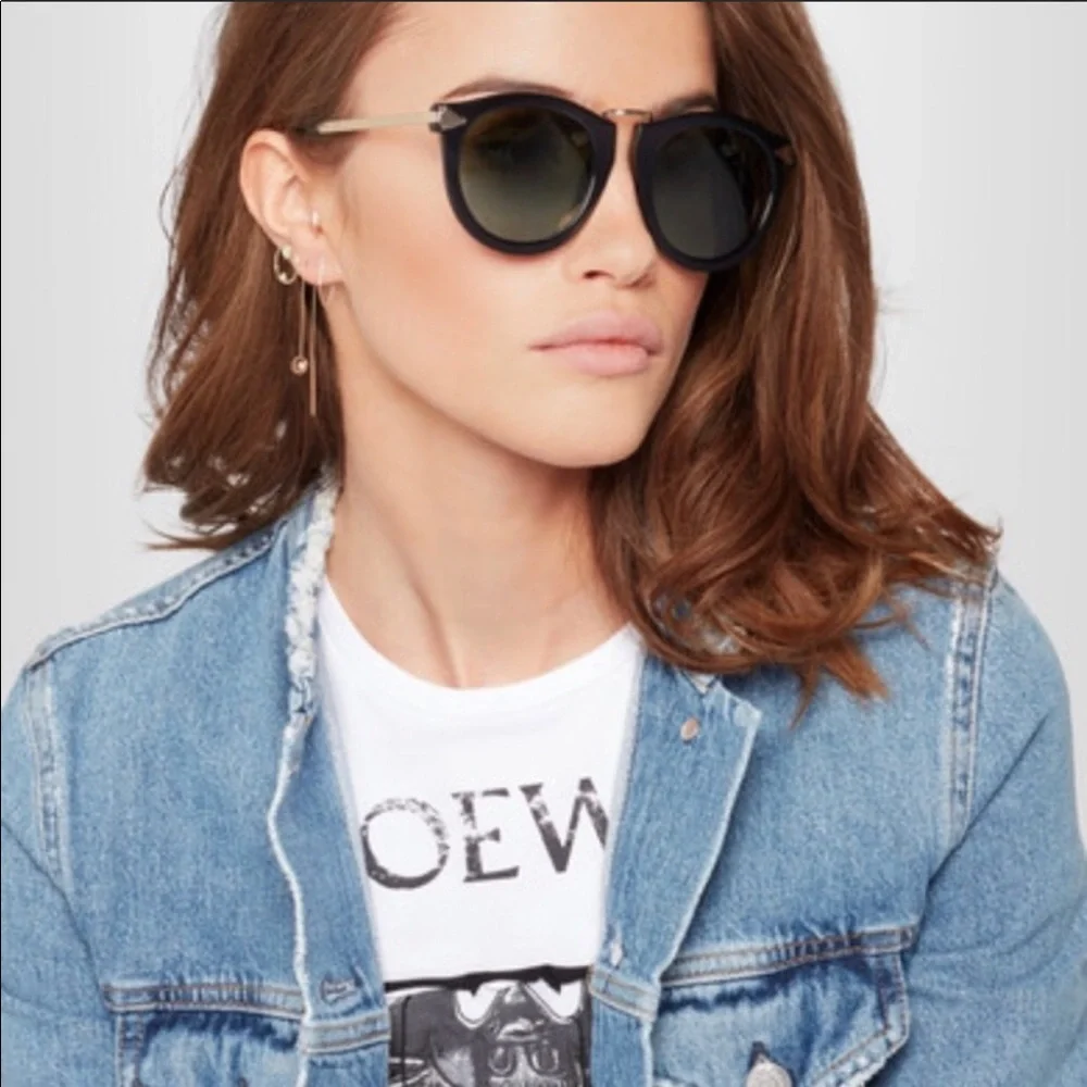 Karen Walker Black Frame Sunglasses with Gold Temples and Dark Green Lenses